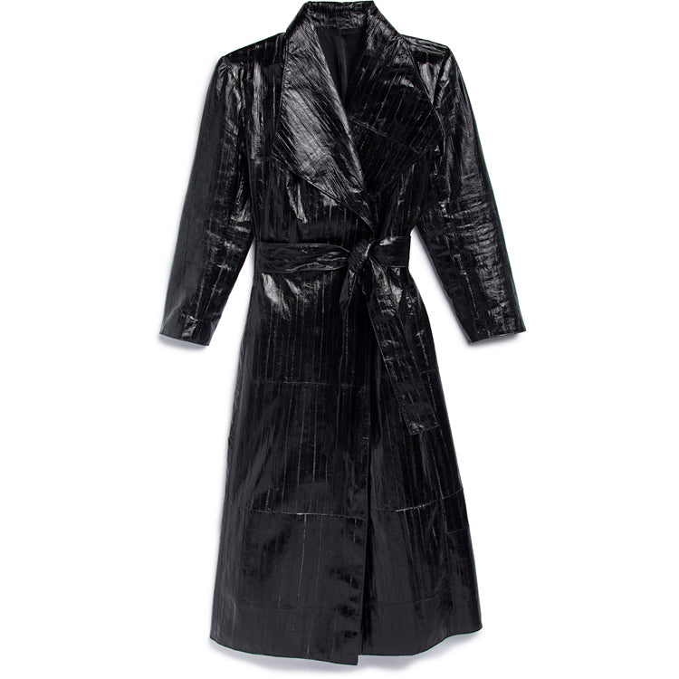 100 % Eel Skin Coat Tie Belt 100% Silk Lined Indulge in luxury, sophistication and elegance with this 100% eel skin coat. Expertly crafted with the finest materials, from the unique tie belt to the 100% silk lining, this coat will elevate any outfit and keep you warm in style. Wrap yourself in refined perfection.